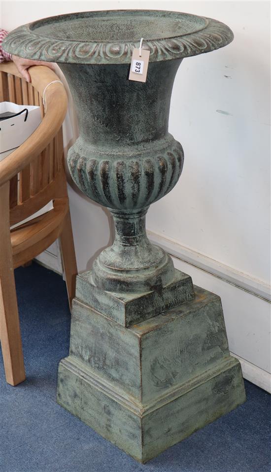 A pair of cast campana garden urns H.108cm